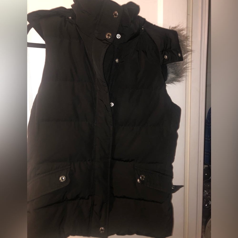 Black vest w/ a hood